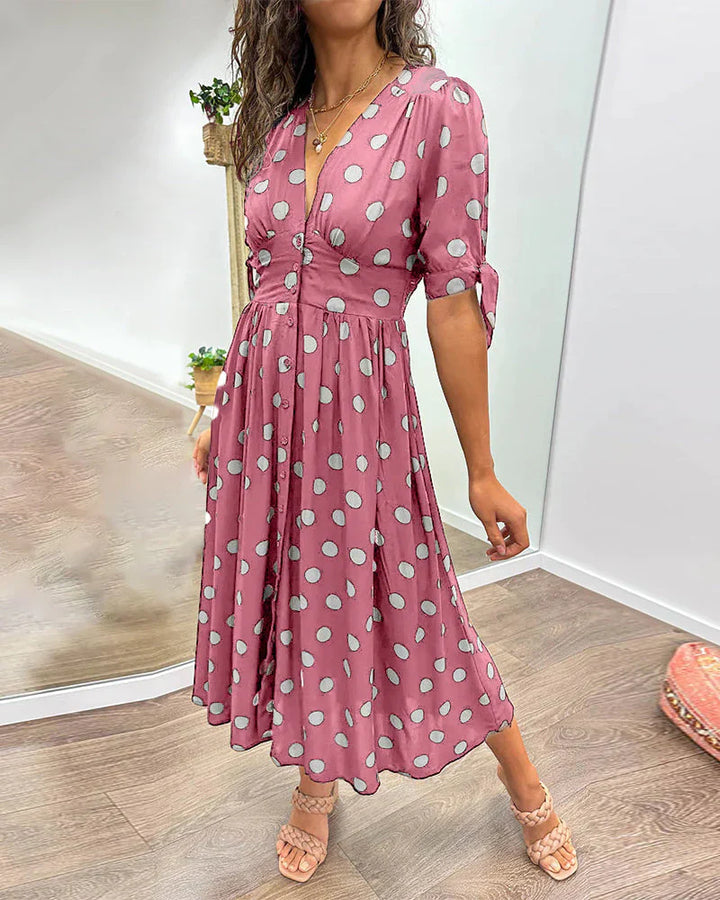 Elisa | Gepunktetes Kleid mit tiefem Ausschnitt und Charme