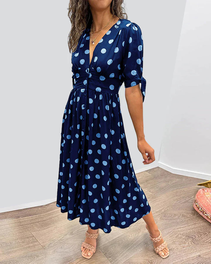 Elisa | Gepunktetes Kleid mit tiefem Ausschnitt und Charme