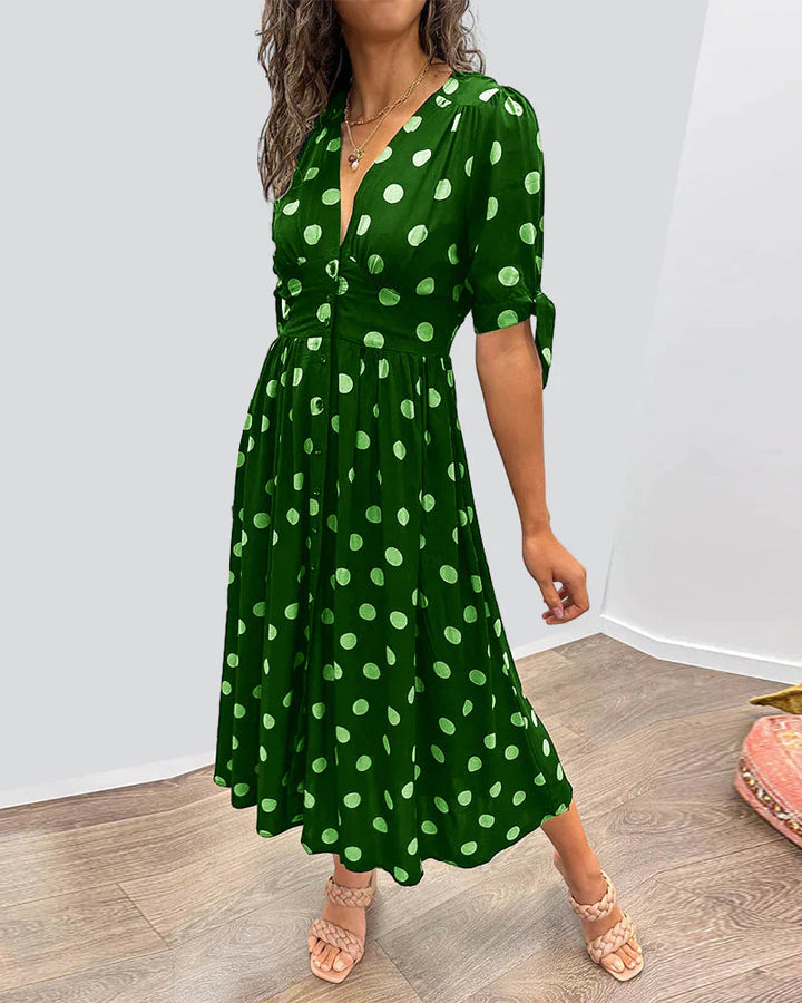 Elisa | Gepunktetes Kleid mit tiefem Ausschnitt und Charme