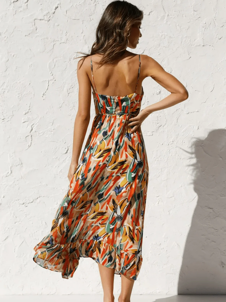 Chiara's | Farbiges Midikleid mit femininem Schwung und Muster