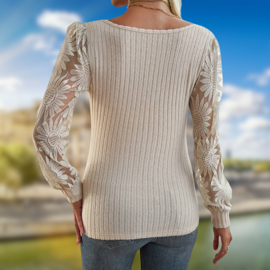 Strickoberteil mit floraler Gänseblümchenspitze