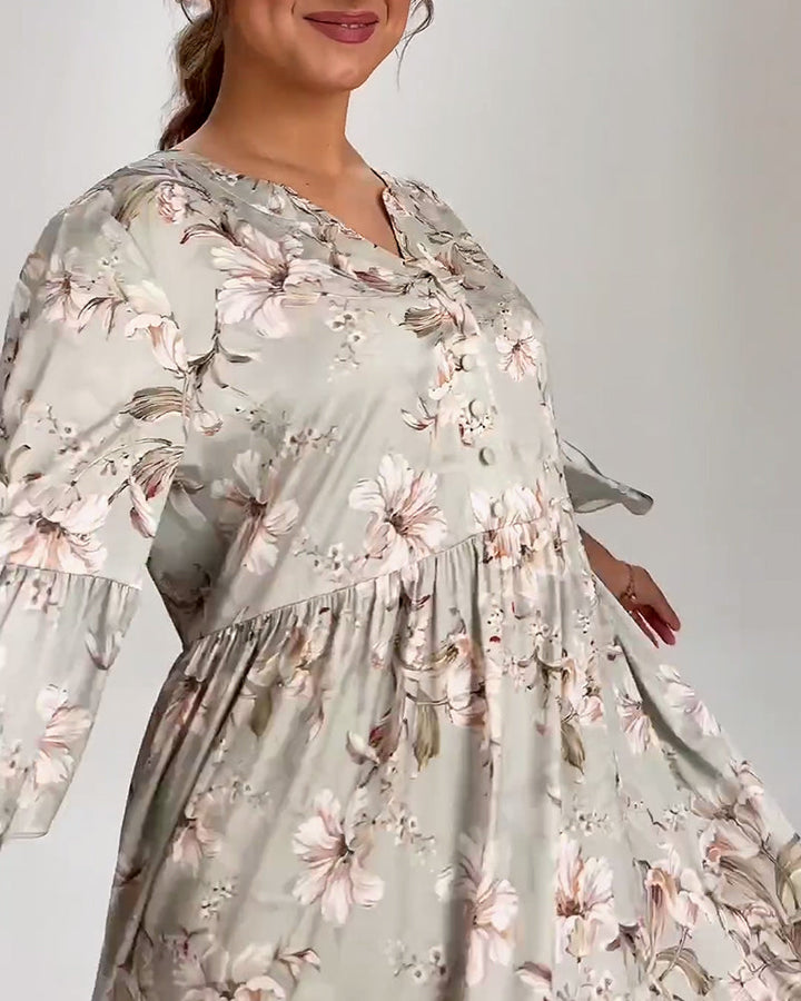 Blumenkleid mit Glockenärmeln und Farbvielfalt