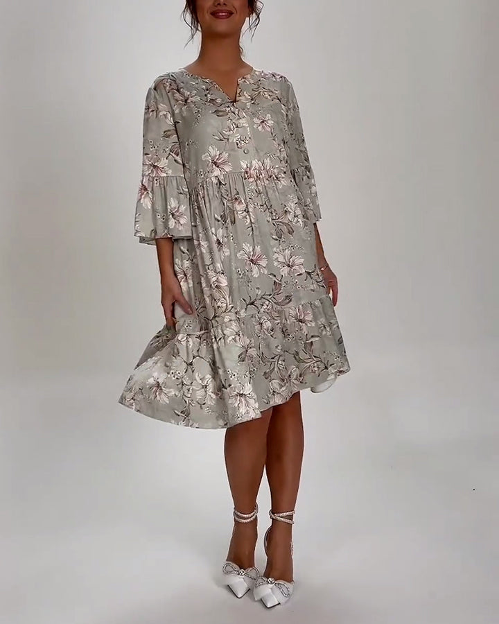 Blumenkleid mit Glockenärmeln und Farbvielfalt