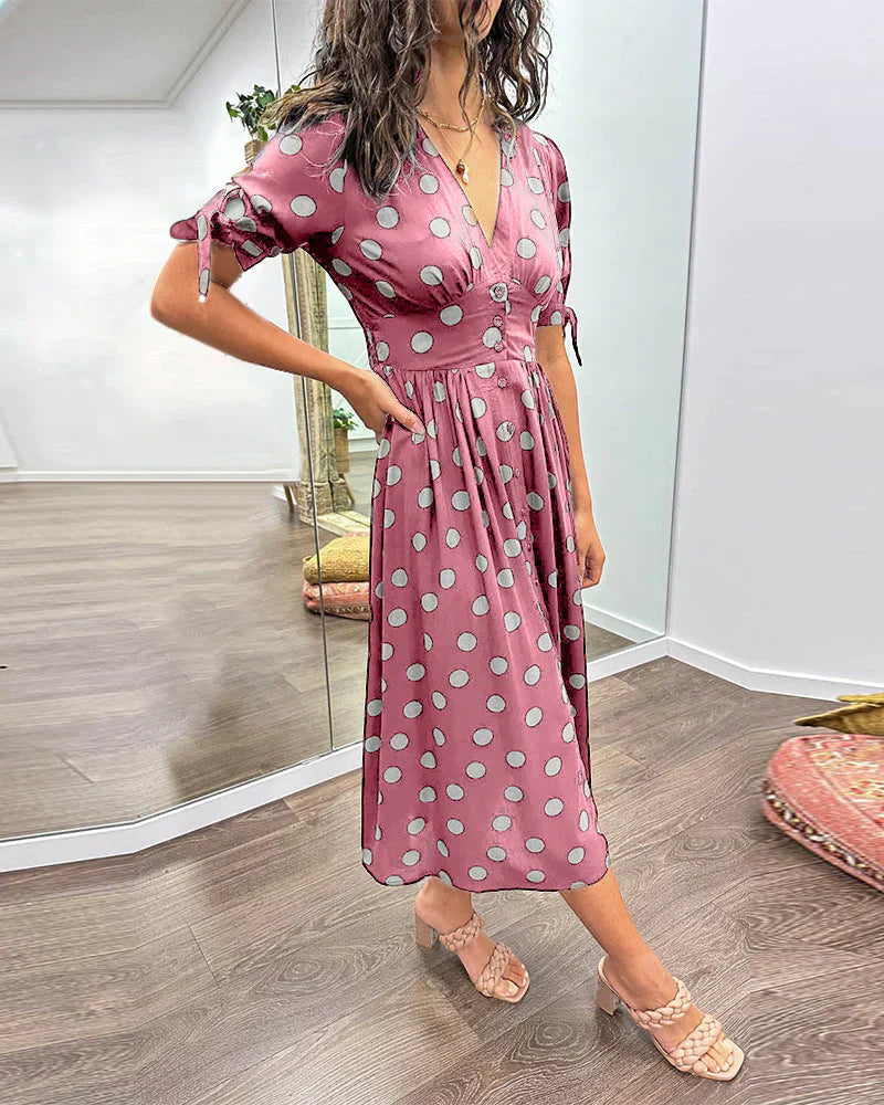 Elisa | Gepunktetes Kleid mit tiefem Ausschnitt und Charme