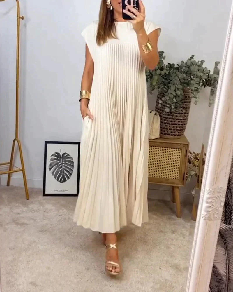 FERN Ärmelloses Faltenkleid für sommerliche Eleganz und Leichtigkeit