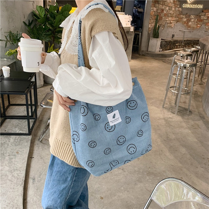 Jimena | Smiley-Tasche aus weichem Kordstoff