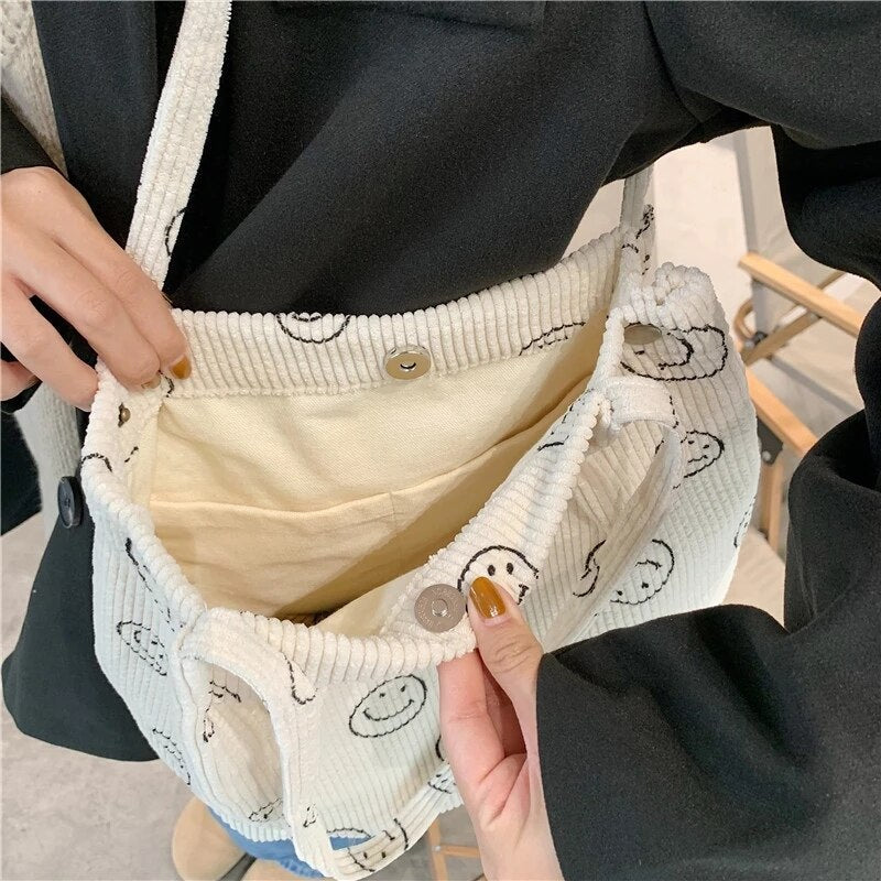 Jimena | Smiley-Tasche aus weichem Kordstoff
