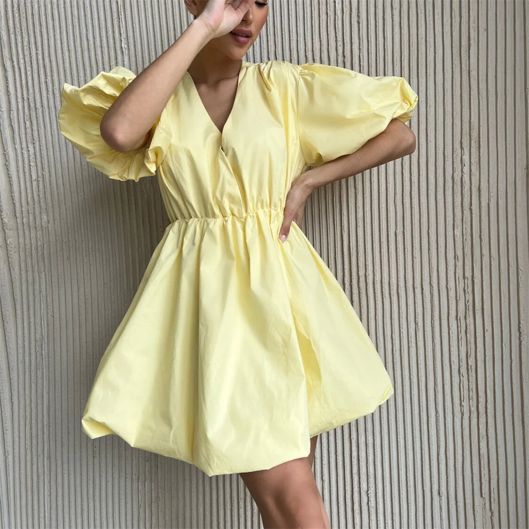 Celia | Kleid mit Puffärmeln und V-Ausschnitt