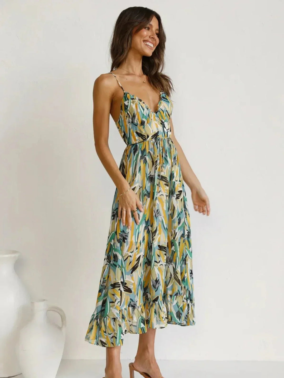 Chiara's | Farbiges Midikleid mit femininem Schwung und Muster