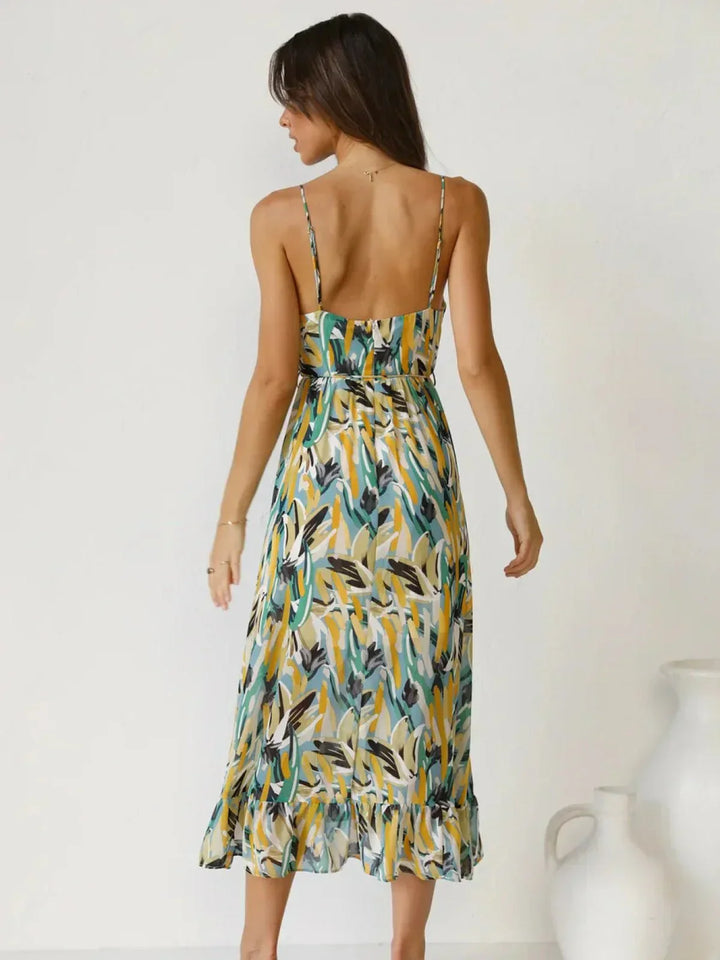 Chiara's | Farbiges Midikleid mit femininem Schwung und Muster