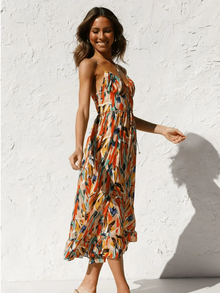 Chiara's | Farbiges Midikleid mit femininem Schwung und Muster
