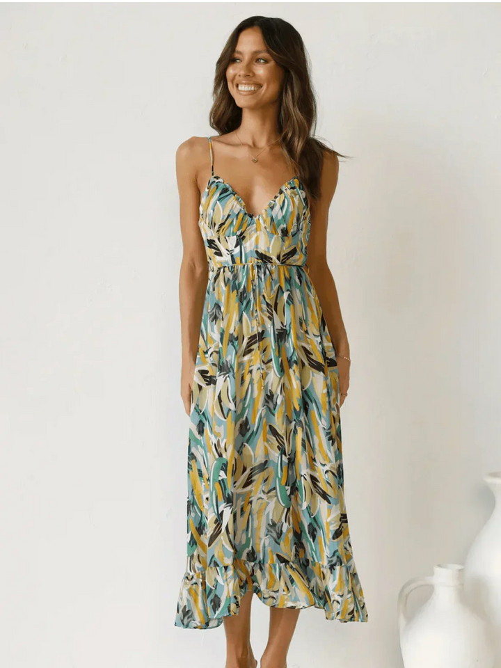 Chiara's | Farbiges Midikleid mit femininem Schwung und Muster