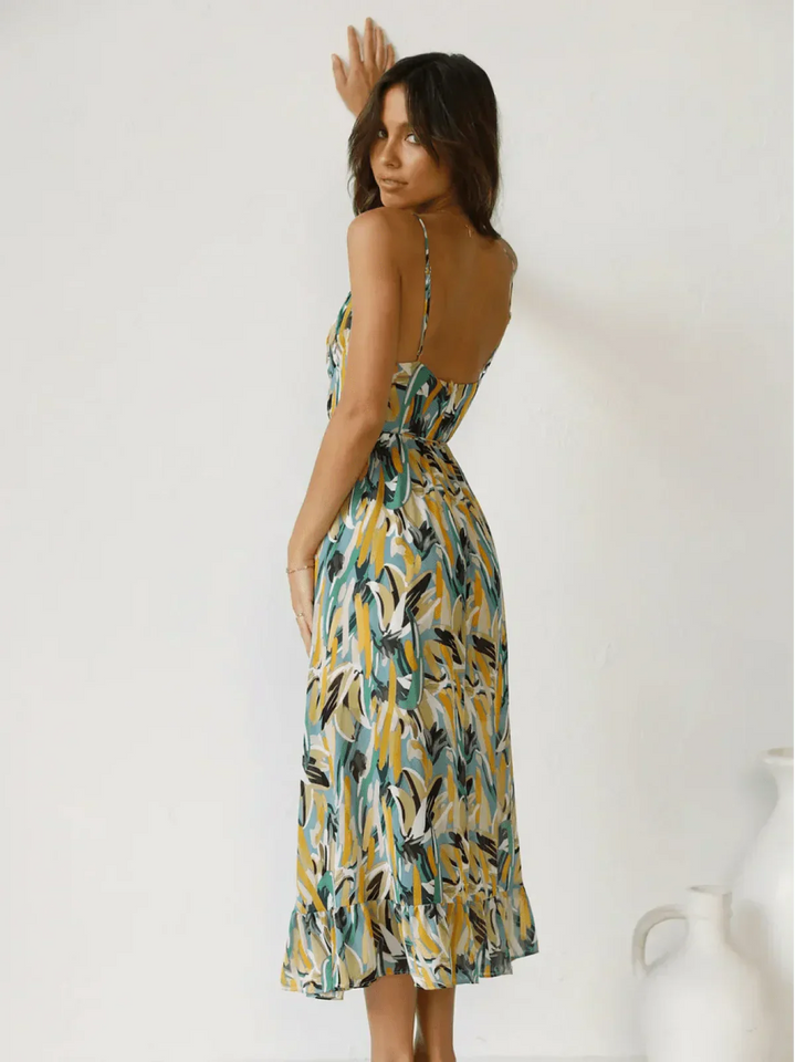 Chiara's | Farbiges Midikleid mit femininem Schwung und Muster