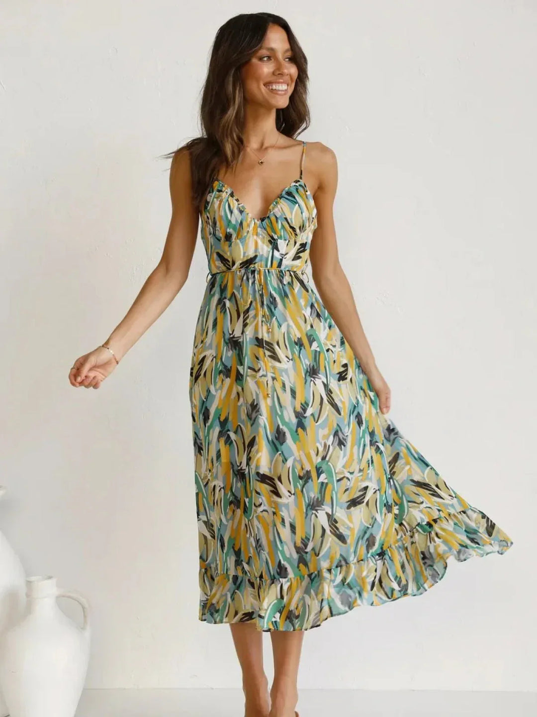 Chiara's | Farbiges Midikleid mit femininem Schwung und Muster
