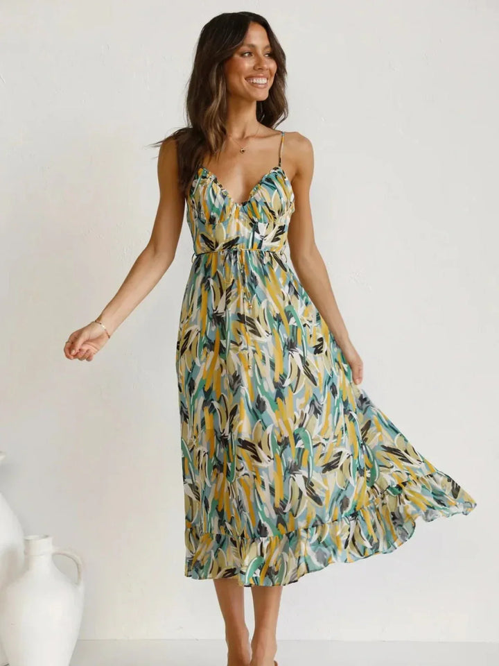 Chiara's | Farbiges Midikleid mit femininem Schwung und Muster