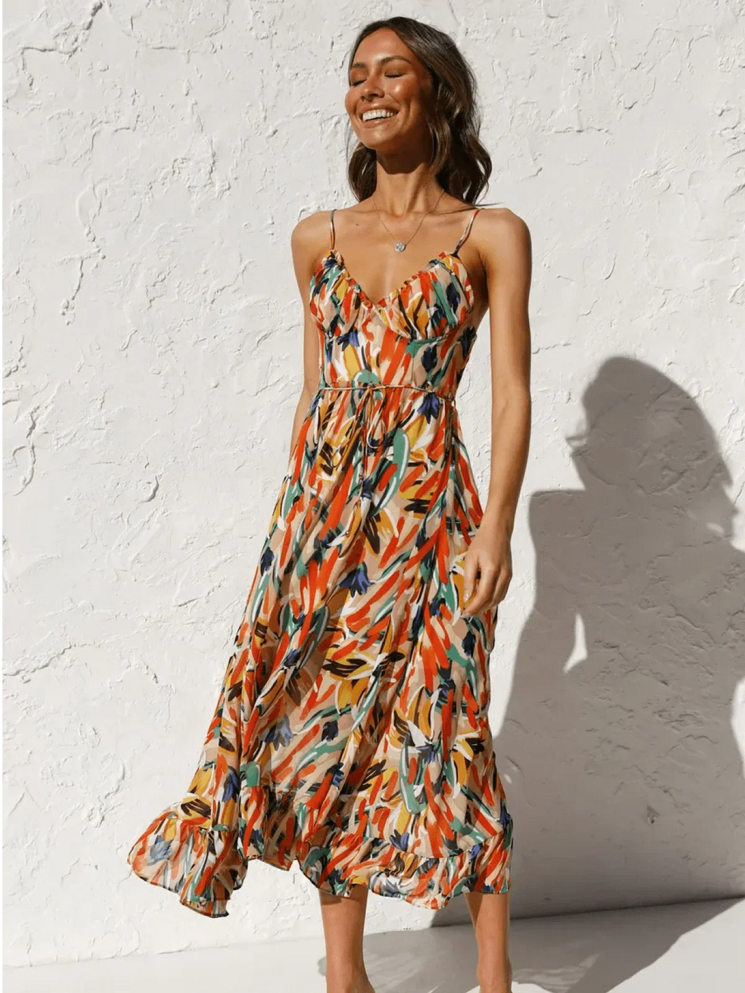 Chiara's | Farbiges Midikleid mit femininem Schwung und Muster