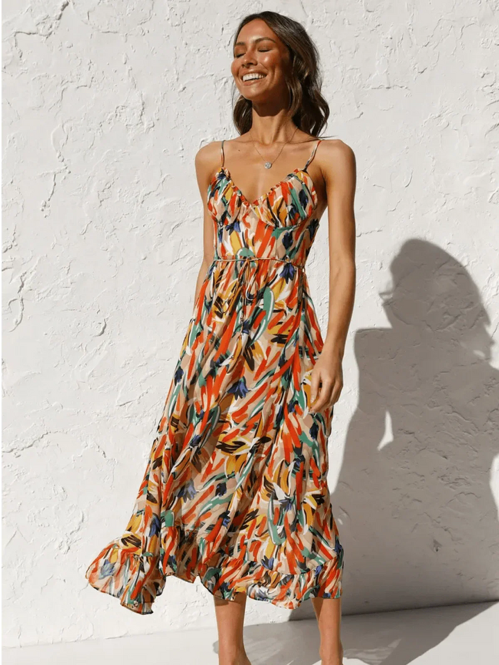 Chiara's | Farbiges Midikleid mit femininem Schwung und Muster
