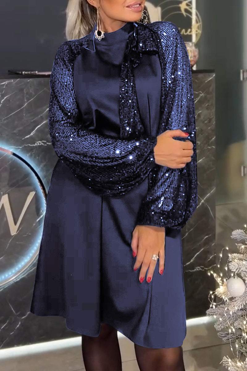 Damenkleid mit Patchwork und glänzenden Pailletten