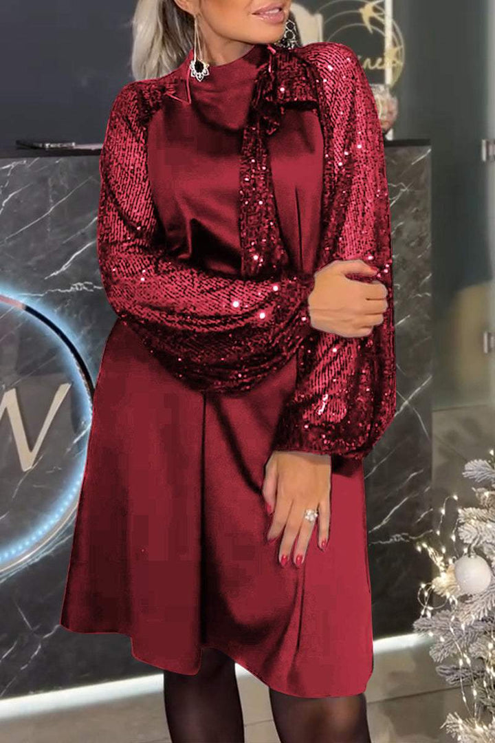 Damenkleid mit Patchwork und glänzenden Pailletten