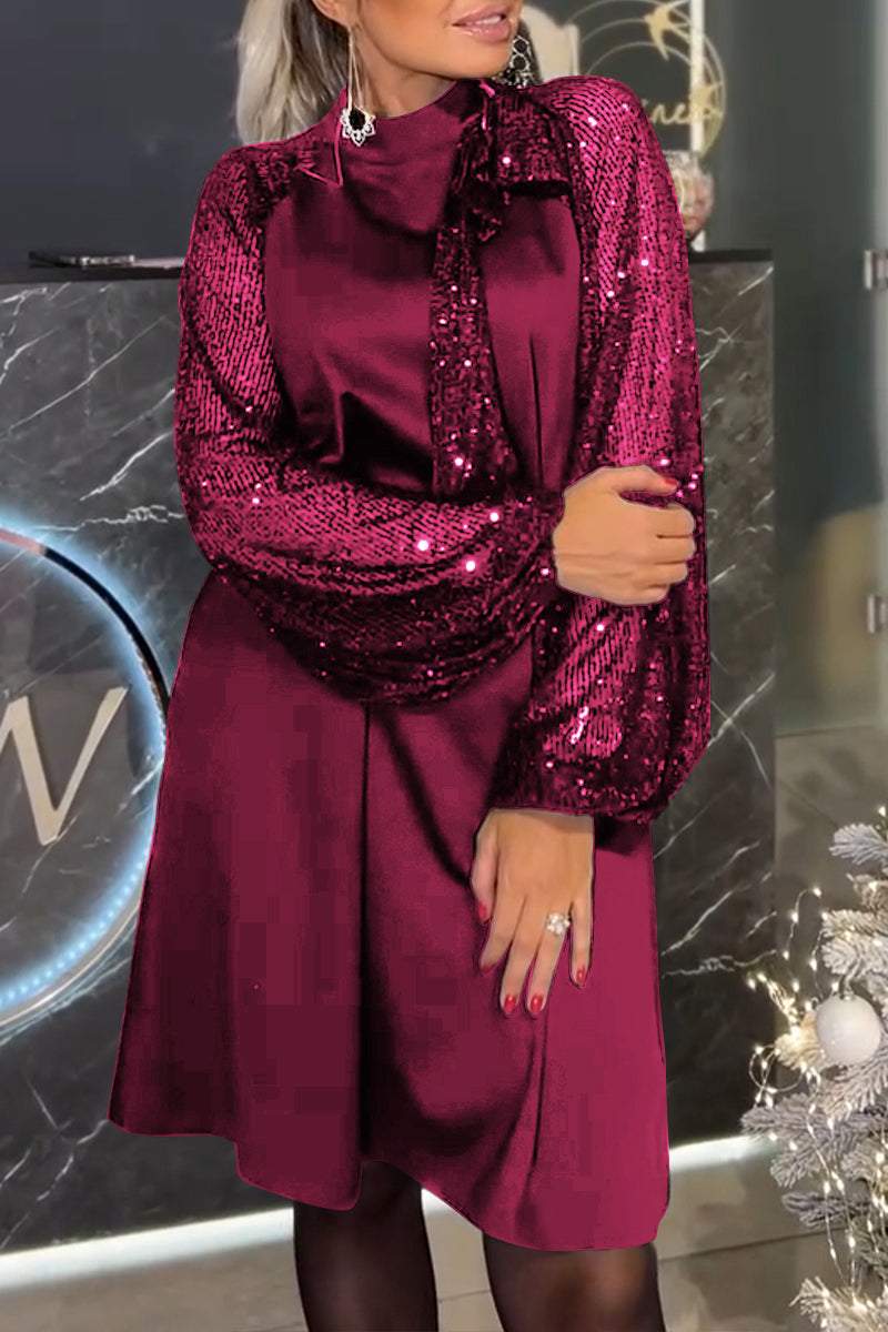 Damenkleid mit Patchwork und glänzenden Pailletten