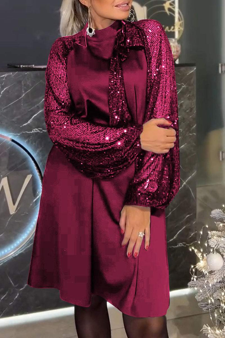 Damenkleid mit Patchwork und glänzenden Pailletten