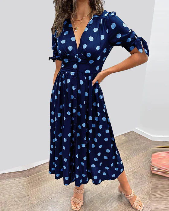 Elisa | Gepunktetes Kleid mit tiefem Ausschnitt und Charme