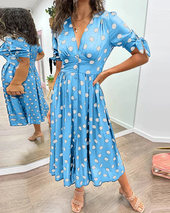 Elisa | Gepunktetes Kleid mit tiefem Ausschnitt und Charme