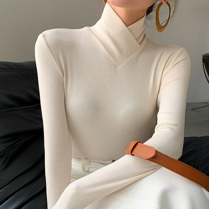 Emma Kreuzturtleneck-Oberteils für trendige und elegante Styles